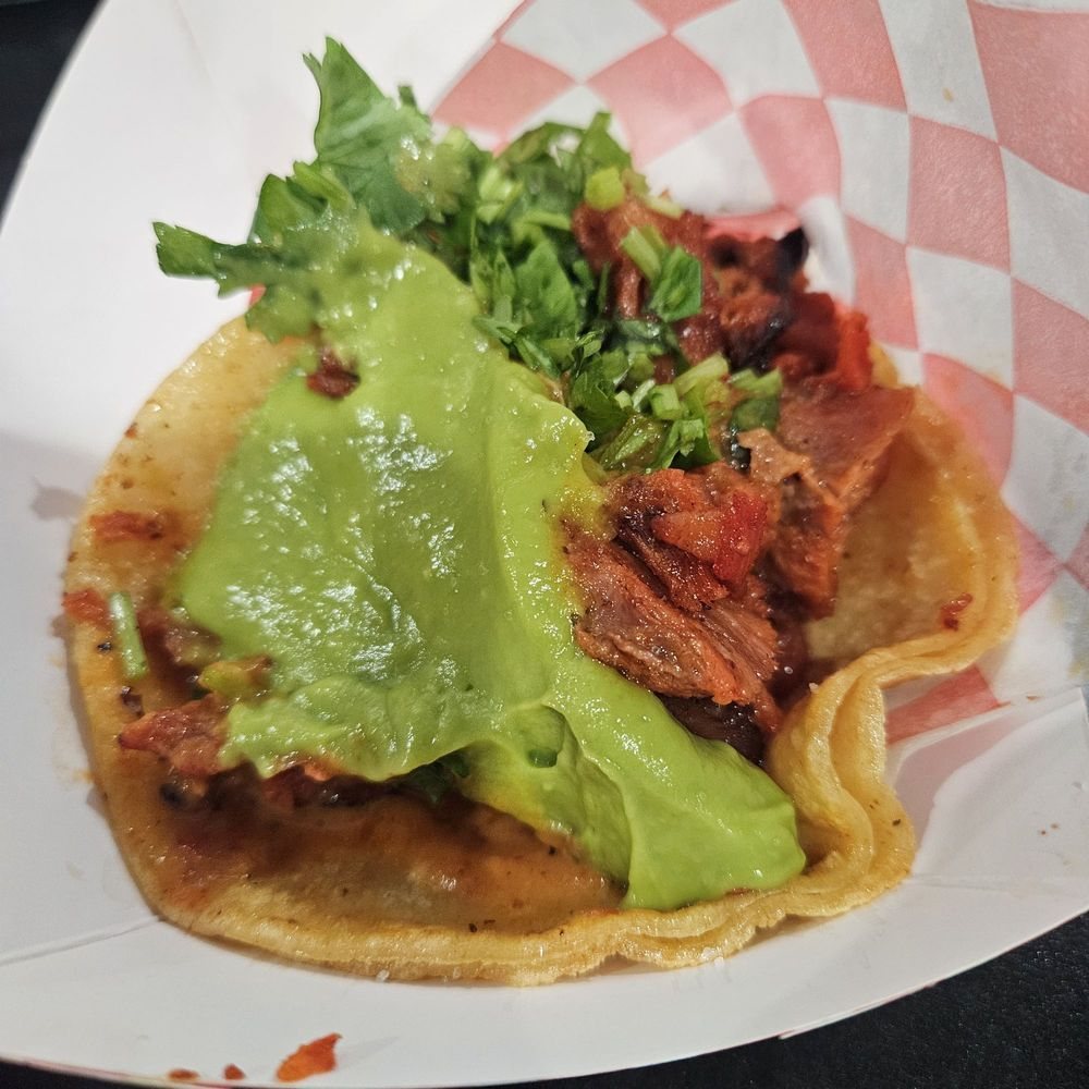 Adobada taco loaded with guacamole at Chula Tacos