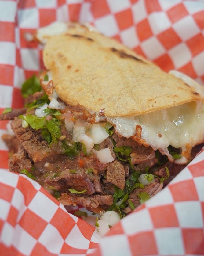 Chula Tacos World Famous Keka, a handmade corn tortilla folded over carne asada with guacamole